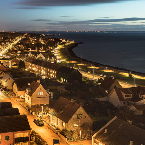 Houses by the sea at night